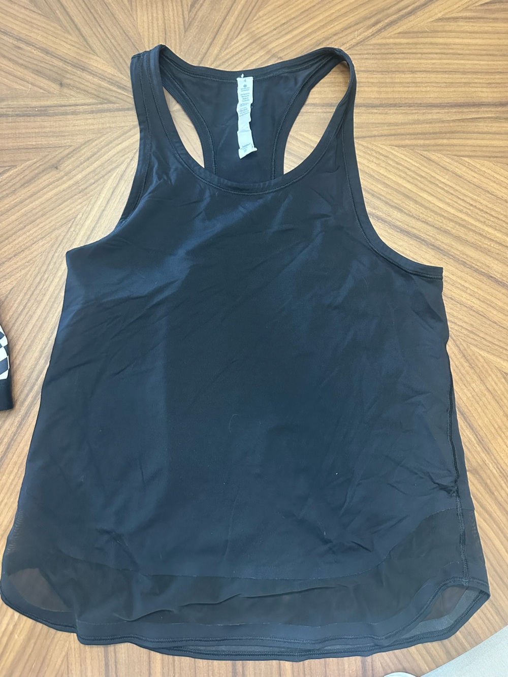Lululemon Black Women's Racerback Tank Top with Mesh Detailing on Bottom